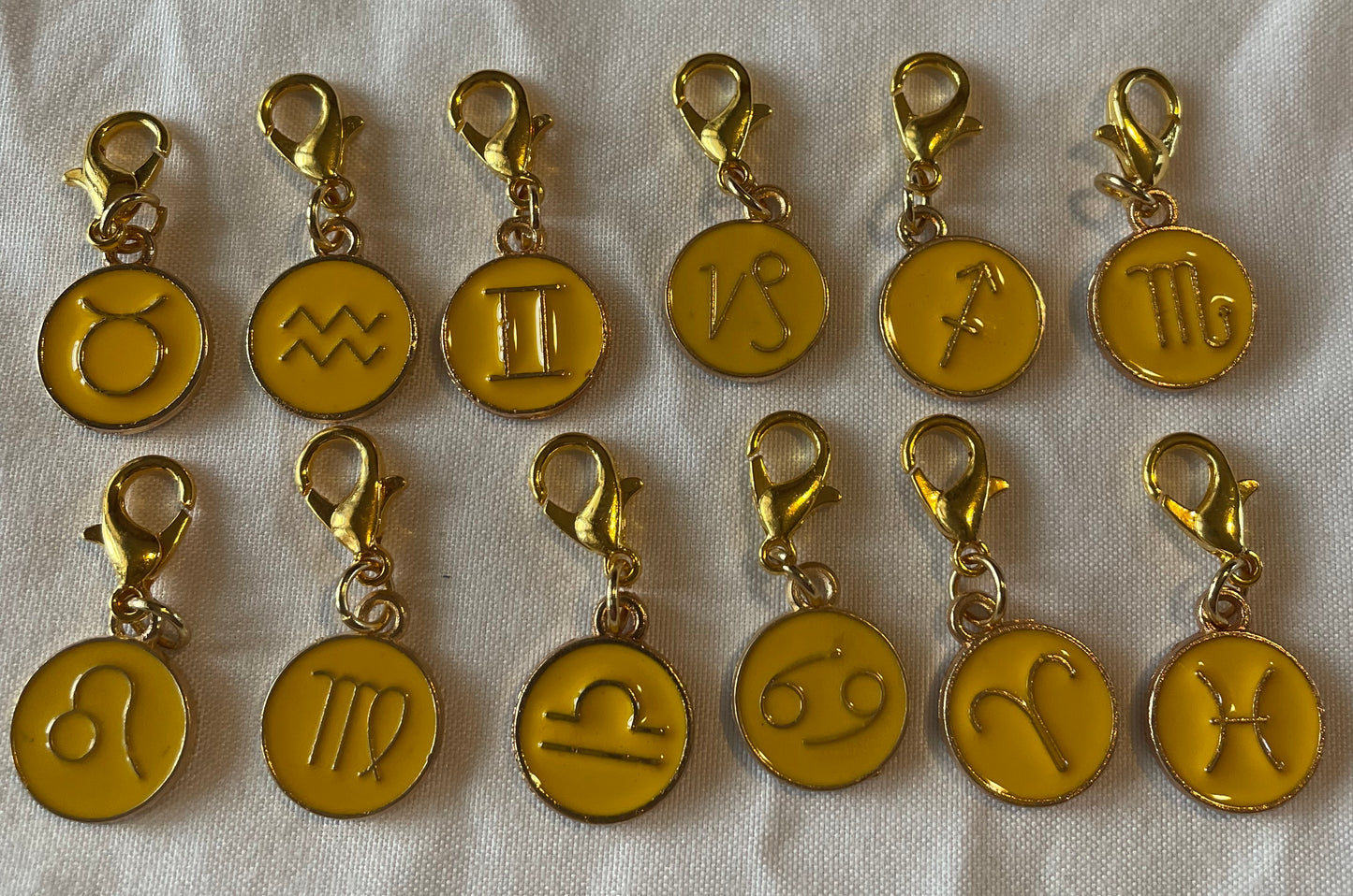 Yellow zodiac keychain 🌌