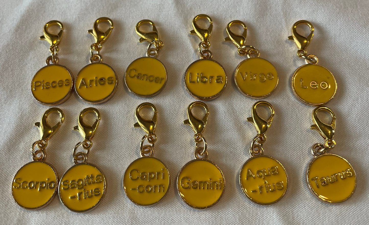 Yellow zodiac keychain 🌌