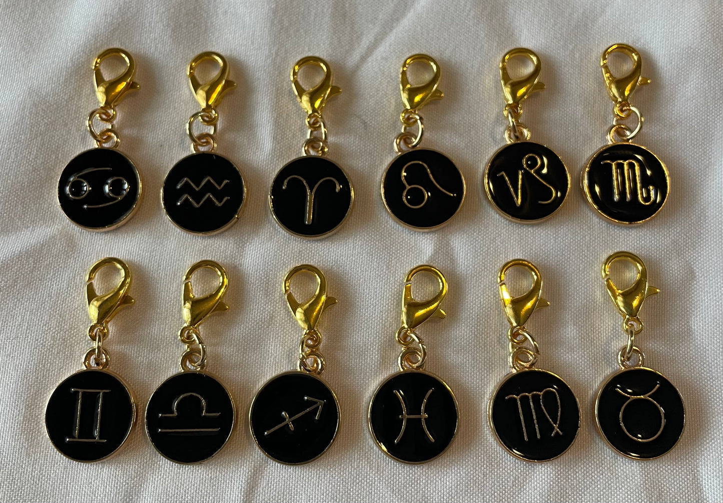 Black zodiac charm 🌌